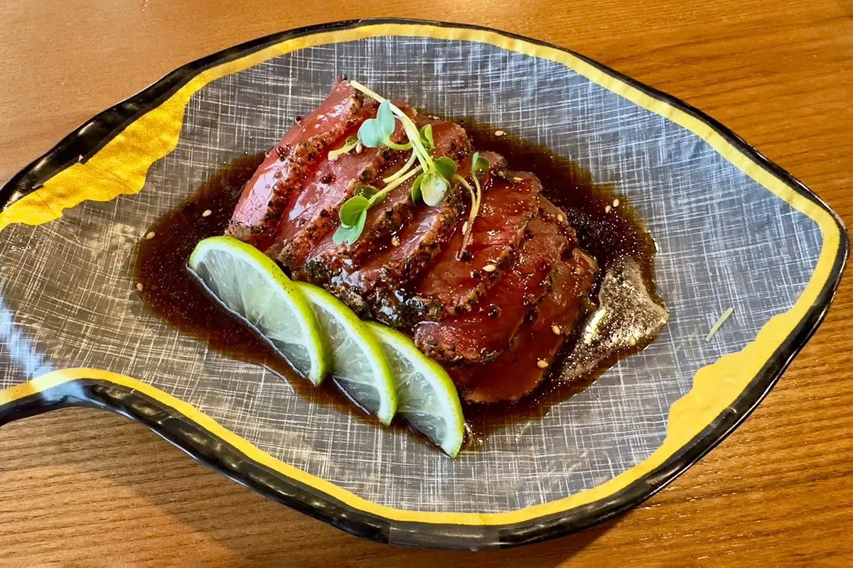 Beef steak with teriyaki sauce, served with lime slices at Gyuto Sushi & Ramen，a Japanese Restaurant in Arlington