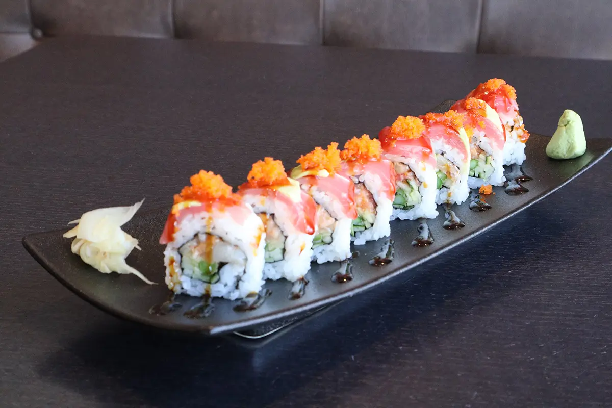 Colorful rainbow sushi roll with assorted ingredients at Gyuto Sushi & Ramen，a Japanese Restaurant in Arlington